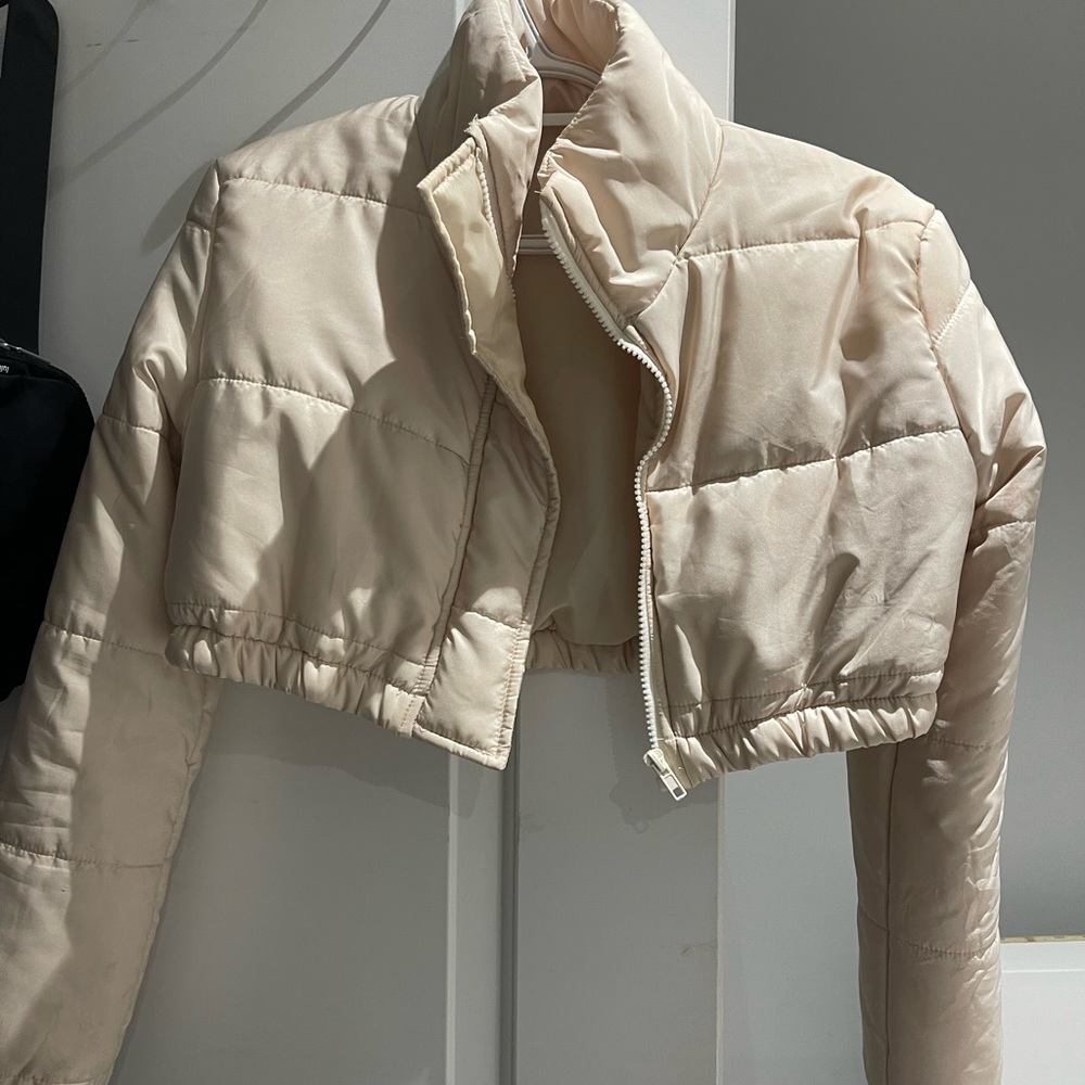 Nude puffer jacket
